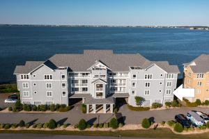an aerial view of a house with the water at BCBPV1411 Ballast Point in Manteo