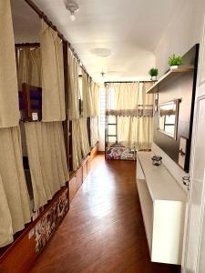 a bathroom with a sink and a counter in a room at Red Monkey Hostel Barra Funda in São Paulo