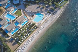 an aerial view of a resort next to the water at Atlantica Nissaki Beach - Adults Only in Gimari