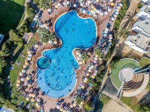 an overhead view of a swimming pool at a resort at Bela Ria Waterfront House Pool & Boat to Beach in Cabanas de Tavira