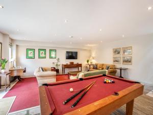 a living room with a pool table at Homewood - Uk36205 in Fordingbridge
