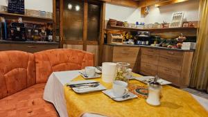 a table in a kitchen with a table sidx sidx sidx sidx at Haus am Schönberg in Sooss +40 photos