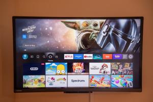 a television with a video game on the screen at Skyevale in Portree +5 photos