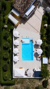 an overhead view of a building with a swimming pool at Masseria Marotta in Santa Paolina