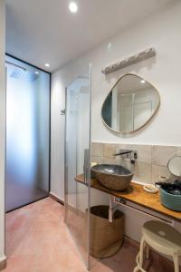 a bathroom with a sink and a mirror at N'haidea - AgriFarm e B&B in Lettere +117 photos