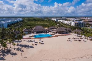 an aerial view of the beach at a resort at Cana Rock Infinity Pool & Beach Club in Punta Cana
