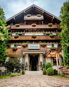 a building with aania sign on the front of it at Hotel Askania 1927 in Bad Wiessee