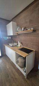 a kitchen with a sink and a counter top at The Loft'y #3 in Famara