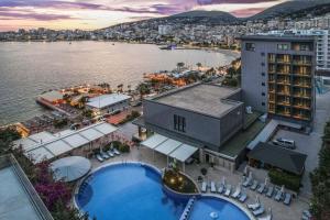 an aerial view of a hotel with a swimming pool at Hotel Saranda Butrinti, Affiliated by Meliá in Sarandë