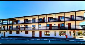 a building with balconies on the side of it at Sea View Smart Choice in Costinesti +12 photos