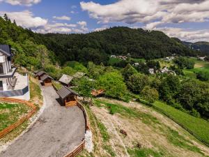 an aerial view of a train station on a hill at Tiny Panorama Cottages in Kamnik +19 photos