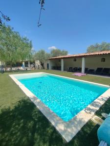 a swimming pool in the yard of a house at Emplacement idéal dans le Var ! in Cuers
