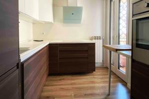 a kitchen with a sink and a counter top at Malpensa-Milano, Terrazza, 2 Bagni in Galliate