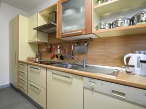 a kitchen with a sink and a counter top at Paradise Jungle in Paradiso