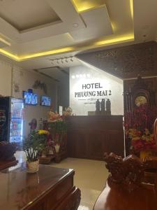 a hotel phuket sign on the wall of a store at Hotel PHƯƠNG MAI 2 in Bến Lức