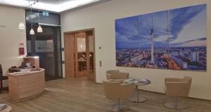 an office with a large painting on the wall at Hotel Vita Berlin-Messe in Berlin