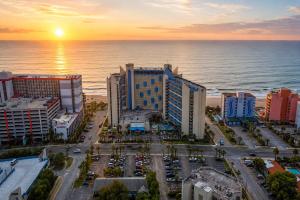 an aerial view of a city with the ocean at New ! Ocean Reef Resort-Unique Renovated Oceanfront Condo -Free parking - Amazing pools & Views in Myrtle Beach +38 photos