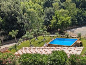 an aerial view of a backyard with a swimming pool at Relais Castrum Boccea in Boccea