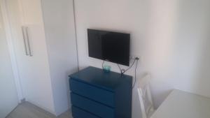 TV i/ili multimedijalni sistem u objektu Apartments Antonio