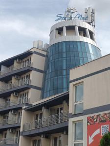 a building with a tower on top of it at Sol e Mar in Sunny Beach +3 photos