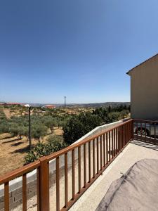 a balcony with a view of the desert at A casa do Avô Cruzes in Cerejais