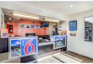 a fast food restaurant with a cash counter at Studio 6 Fort Collins CO in Fort Collins +29 photos