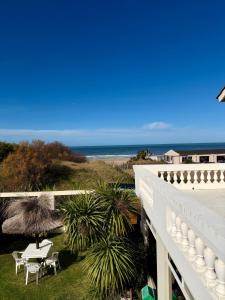 a balcony with a view of the ocean at Ivamar Hotel & Apart in Ostende