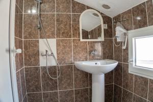 a bathroom with a shower and a sink at BEB House Ulcinj in Donji Štoj +44 photos
