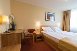 Posteľ alebo postele v izbe v ubytovaní Hotel Gorzów