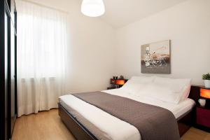 Postel nebo postele na pokoji v ubytování Apartments Agava Romantic