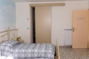 Postel nebo postele na pokoji v ubytování Affittacamere da Beppe
