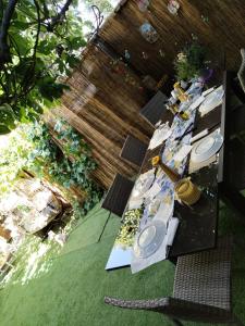 a table set up for a meal in a backyard at Casa Jardin Huesca Ciudad in Huesca