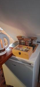 a box of food sitting on top of a refrigerator at KAM-TECH Krzysztof Kamiński in Krzywy Róg