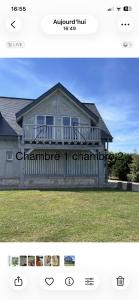 a picture of a house with a porch at Le balcon in Beaumont-le-Hareng