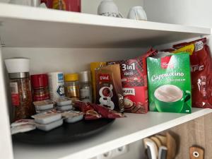 a shelf with various food products on it at No name in Jajce