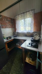 a kitchen with a counter and a stove in it at Kairos Vista in Sedgefield +52 photos