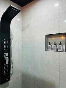 a shower stall in a bathroom with a shower at La Casa Bella in Ella +282 photos