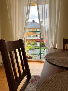 a room with a window with a view of a yard at Apartmán Pod Jánským Vrchem in Javorník