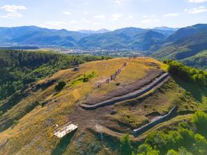 a group of people standing on top of a hill at Seosko domaćinstvo Kastratović in Berane
