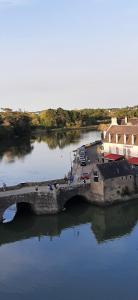 an aerial view of a bridge over a body of water at Chambre d'hôtes Thé ou Café in Auray +5 photos
