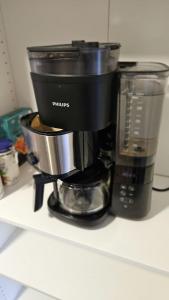 a coffee maker sitting on top of a counter at Orscholz apt with free parking & garden & bicycle storage in Orscholz