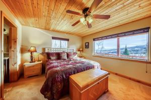 a bedroom with a bed and a ceiling fan at Brian Head 'View-Topia' w/ Mtn Views & King Suite in Brian Head