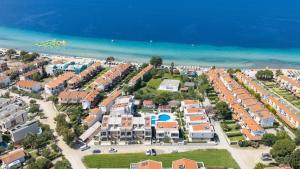 an aerial view of a resort near the beach at DARION Residence in Nikiti +178 photos