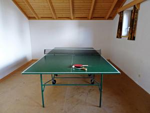 Taula de ping-pong a Haus Christina o a prop