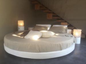 Posteľ alebo postele v izbe v ubytovaní Villa Il Cappero