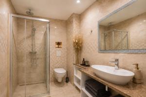 a bathroom with a sink and a shower and a toilet at Johanan 2 in Makarska +45 photos
