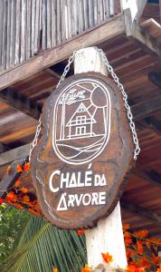 a sign that says chile da approve hanging on a pole at CHALÉ ANGELIM in Belém