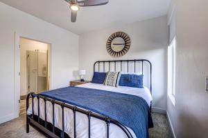 a bedroom with a bed and a mirror on the wall at Poolside Retreat - King Beds - Dog Friendly in St. George +31 photos