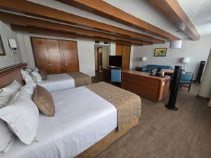 Postel nebo postele na pokoji v ubytování Hotel Metropol + 47 fotografií