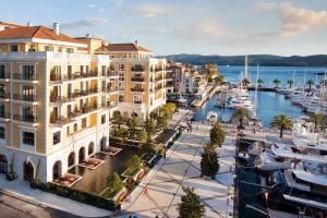 a view of a harbor with boats in a marina at Regent Porto Montenegro in Tivat